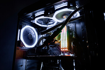 Gaming PC with RGB white LED lights on a computer assembled with hardware components