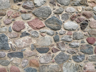 stones in the castle wall - texture & background - obrazy, fototapety, plakaty