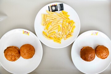 Delicious meat kebab with fresh vegetable salad served with variety of Turkish dishes and appetizers. Top view of assorted Turkish food and meze, tasty and healthy Mediterranean cuisine.