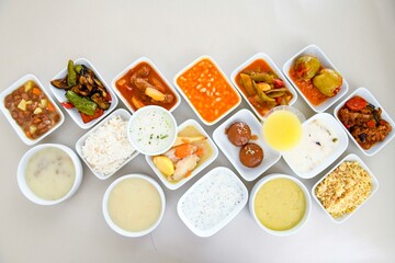 Delicious meat kebab with fresh vegetable salad served with variety of Turkish dishes and appetizers. Top view of assorted Turkish food and meze, tasty and healthy Mediterranean cuisine.