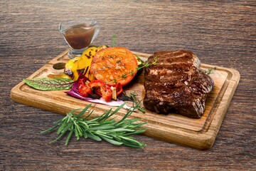 Grilled beef meat steak on board. Tasty food