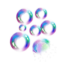 Soap bubbles are flying in the air on an isolated background. The soap bubble burst