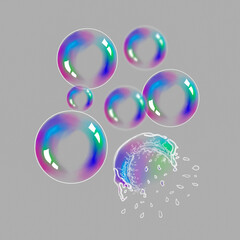 Soap bubbles are flying in the air on an isolated background. The soap bubble burst