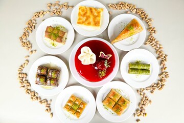 Turkish Dessert Sobiyet , havuc dilimi,  midye  Baklava, mussels baklava and classic baklava with Pistachio . Cevizli, Fistikli Baklava, top view.