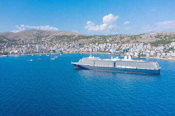 Cruise ship off the coast of Saranda. Albania. Promenade. City. View from a height