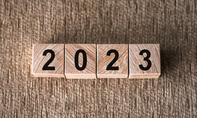 2023 New year concept. Wooden cube block with text 2023