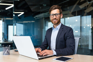 Portrait of mature boss inside office with laptop, successful and satisfied investor manager...