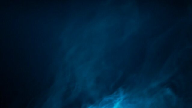 Smoke in the dark. spreading steam. abstract foggy background