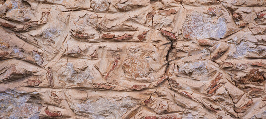 Background of brick, stone and old clay