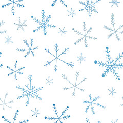 Seamless winter pattern with blue snowflakes on a white background