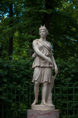 Fototapeta premium Marble Sculpture of Roman Goddess Artemis Diana in the Summer garden, Saint Petersburg; Russia