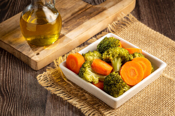Bowl with broccoli and carrot salad.