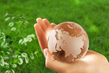 ESG Environment, Society and Corporate Governance. Hand with globe