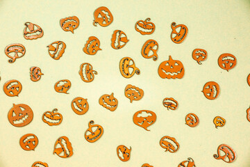 Halloween carved in wood Pumpkins pattern on colored background.