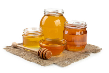 various honey jars and honey stick isolated on white background