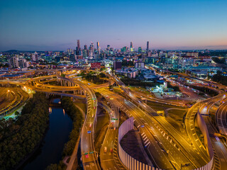 Aerial view of Brisbane city and highway traffic in Australia at night