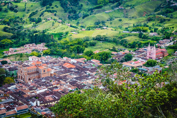 Fototapeta na wymiar Jerico Town Colombian Deparment of Antioquia Medellin Aerial Drone Fly Out of The Catholic Pueblo Urban Church Zone into Wilderness