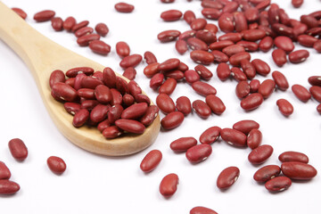 Red beans in a wooden bowl on a white background 