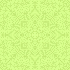 Green square background with mandala ornament.