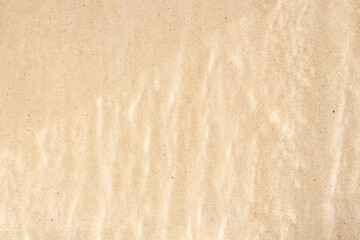 The flowing water on the stone wall forms a natural water pattern.