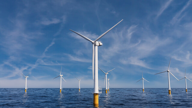 Wind Power. Offshore Wind Turbines on a Hazy Morning. Environmental Electricity Concept.