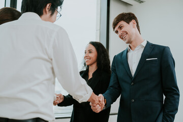 professional business people shaking hands in the office. Finishing successful meeting. businessman persons handshake with partner teamwork, concept of partnership approve a job agreements deal