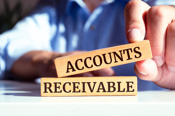 Wooden blocks with words 'ACCOUNTS RECEIVABLE'. Business concept