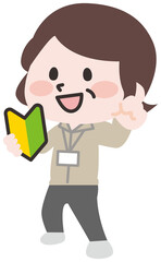 初心者マークを持つシニア店員さん