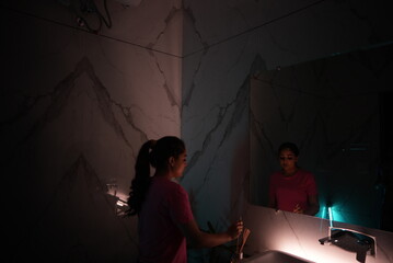 man in dipression hiding himself in a room