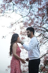 couple kissing in park