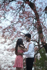 Fototapeta premium couple doing dance in park