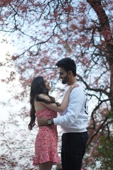 Fototapeta premium couple doing dance in park