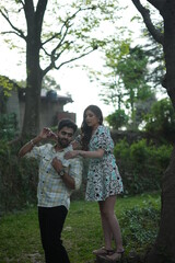 Fototapeta premium couple having fun in park