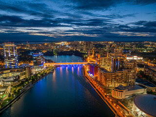 Yekaterinburg city and pond aerial panoramic view at summer or early autumn night. Night city in the early autumn or summer.