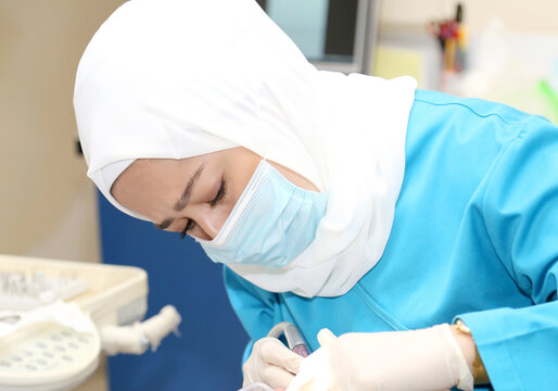 Dentist with facemask