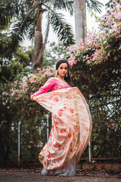 Portrait of young woman wearing traditional indian dress