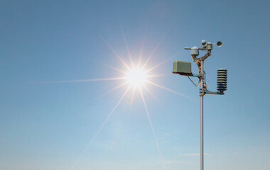 Weather station automatic measurement of weather parameters with Clear sky and sun