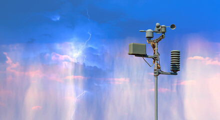 Weather station automatic measurement of weather parameters with Stormy sky and rain, rainbow