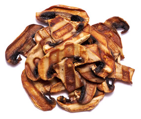 Grilled Slices of champignon mushrooms with stripes from a grill isolated on white background