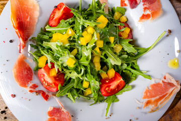 Rocket salad with dried Spanish ham