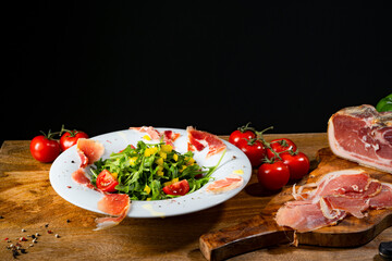 Rocket salad with dried Spanish ham