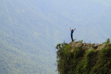 Young man on the road of death, Yungas - Bolivia