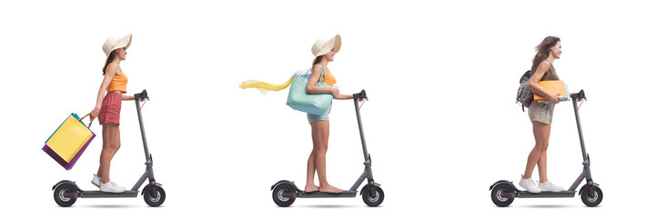 Young woman riding an e-scooter © stokkete