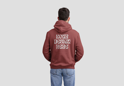 Man Showing The Back of a Hoodie Mockup With Customizable Colors