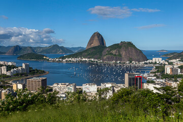 An afternoon view in Rio de Janeiro in Brazil looking towards Sugarloaf Mountain which sits in Guanabara Bay. This is one of Rio de Janeiros' most famous landmarks.