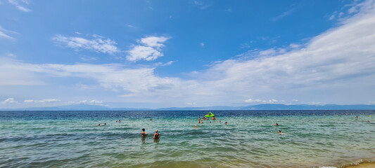 Pakis beach on the Greek island of Thasos during a sunny summer day. © MoiraM