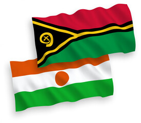 Obraz premium National vector fabric wave flags of Republic of the Niger and Republic of Vanuatu isolated on white background. 1 to 2 proportion.