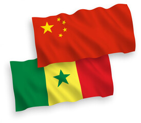 National vector fabric wave flags of Republic of Senegal and China isolated on white background 1 to 2 proportion.