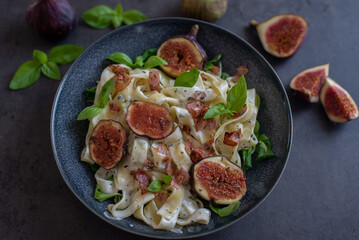 healthy pasta with figs and fresh green basil