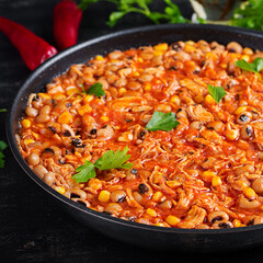 Chili con carne in bowl - traditional dish of mexican cuisine.